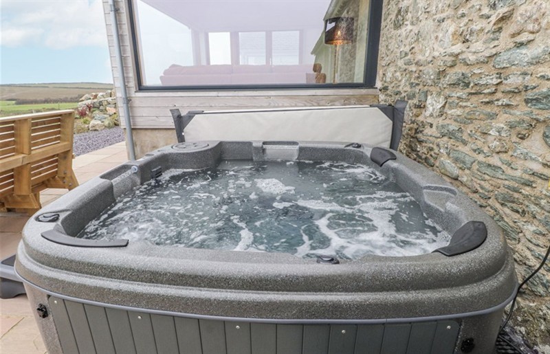 The hot tub at 2 Trem Y Mor, Llanfwrog near Llanfachraeth, Ynys Môn / Isle of Anglesey