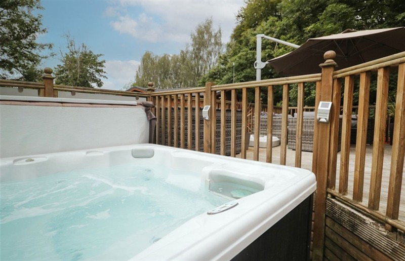 The hot tub at Easedale Lodge, Waterside Wood 2, White Cross Bay near Windermere, Lake District