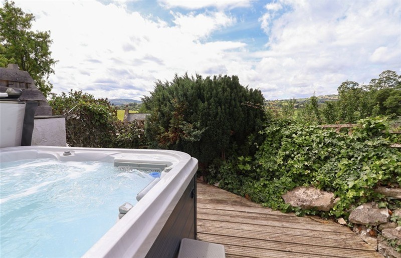 The hot tub at Tenandeleven Cottage, Henllan, Denbighshire