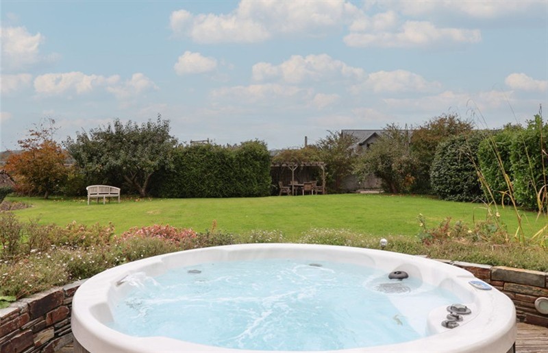 The hot tub at The Old Manor House, Lifton, Devon