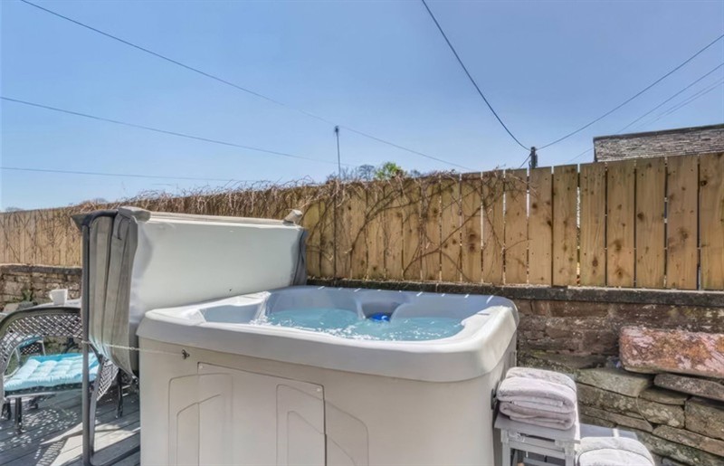 The hot tub at The Quirky Cottage, Eamont Bridge near Ullswater, Cumbria